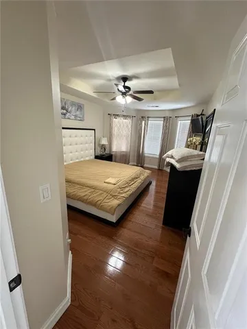 a view of a balcony with a potted plant