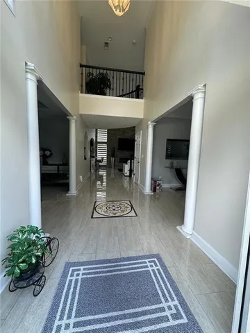a view of a livingroom with table and chair