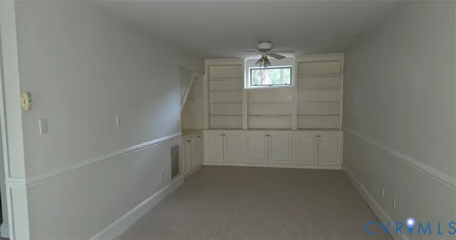 a view of an empty walk in closet