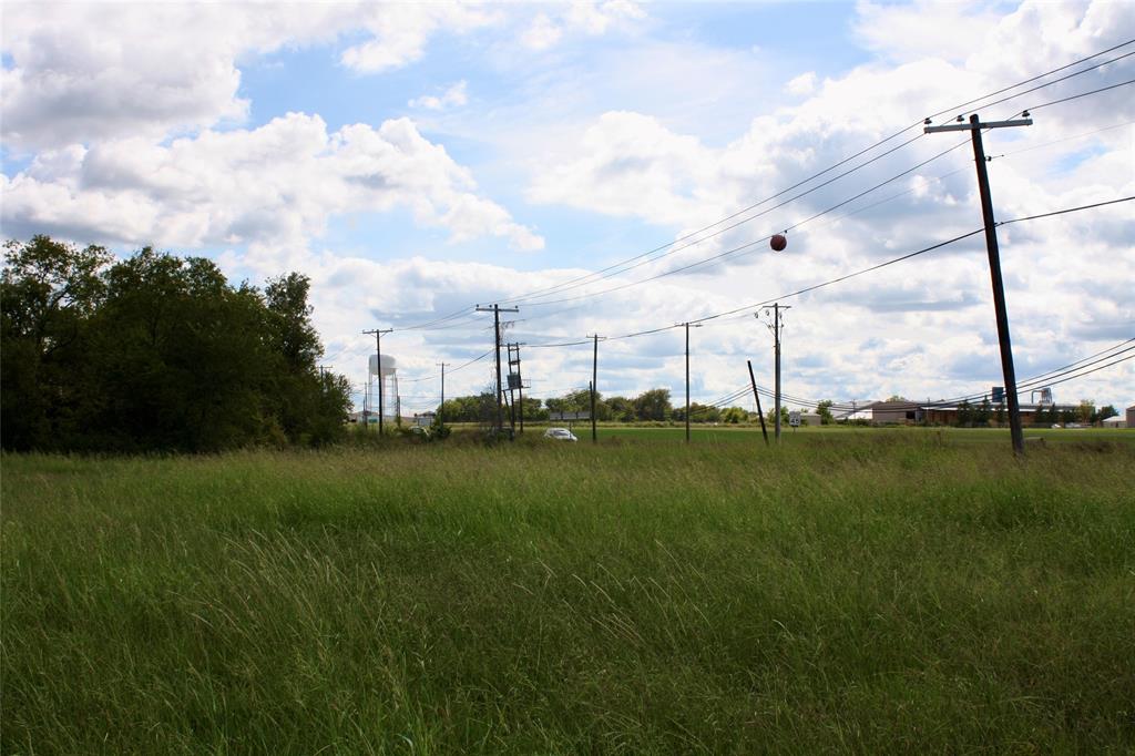 Tbd North Center Street Bonham, TX 75418 - Photo 2 of 6 a view of a golf course with a lake