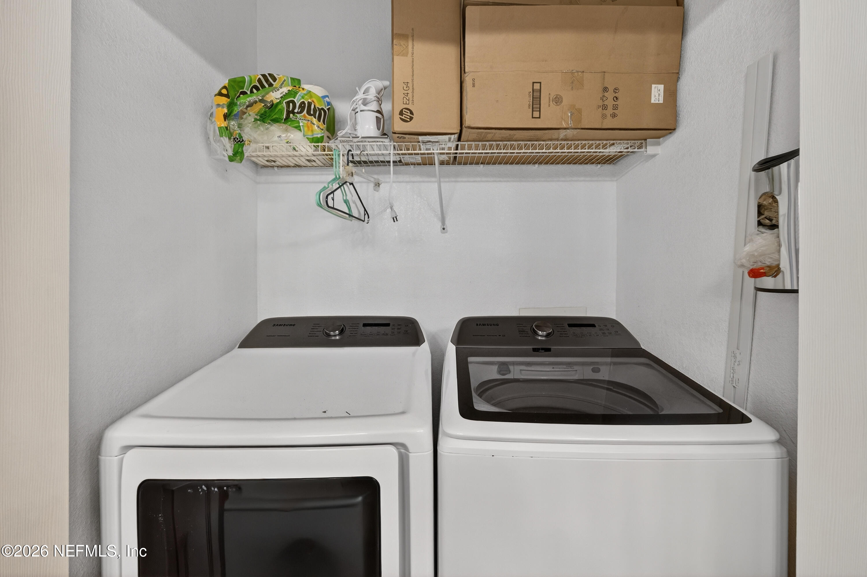 10961 Burnt Mill Road, Unit 1524 Jacksonville, FL 32256 - Photo 19 of 38 a close view of washer and dryer