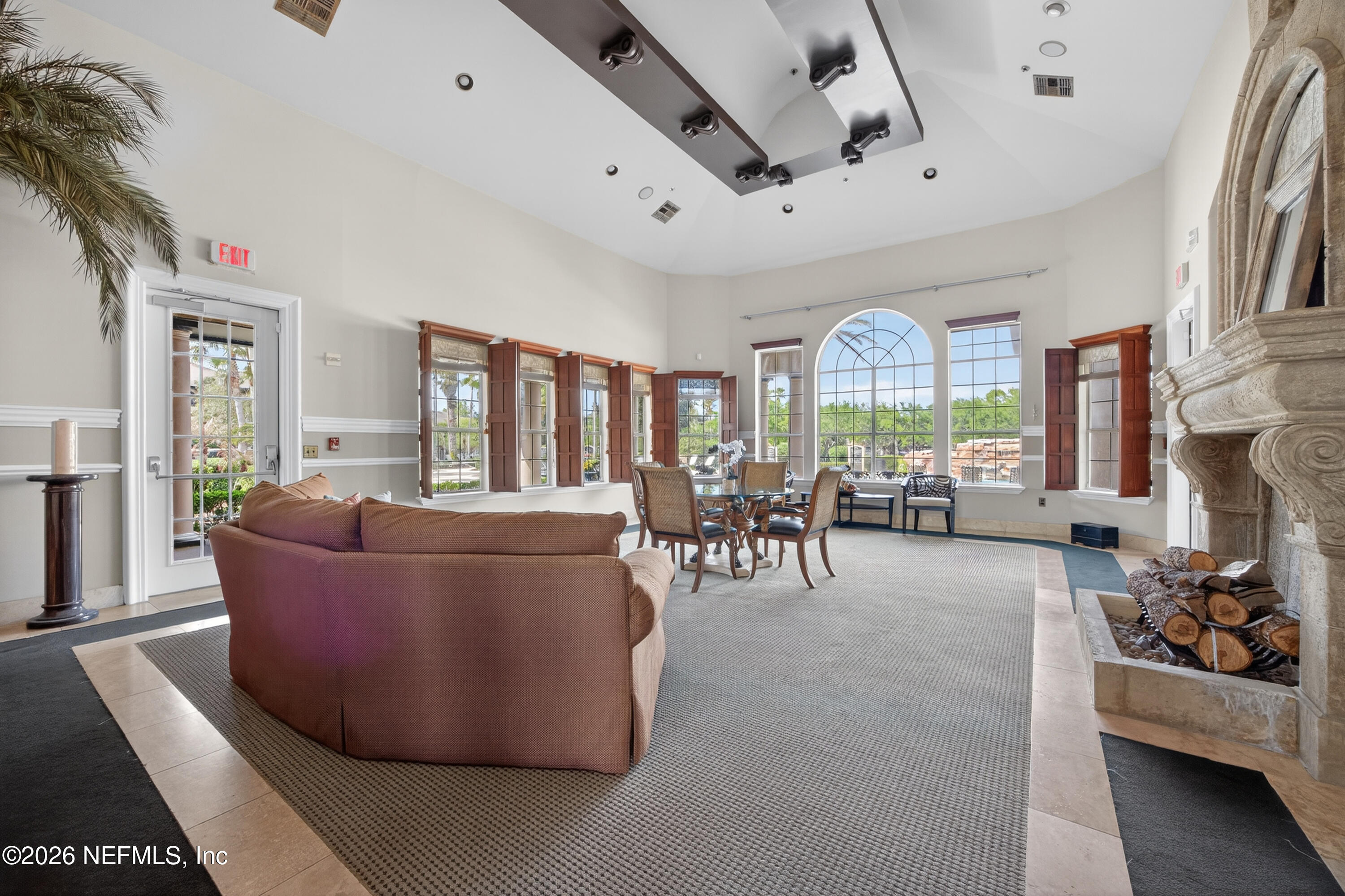 10961 Burnt Mill Road, Unit 1524 Jacksonville, FL 32256 - Photo 29 of 38 a living room with furniture and a large window