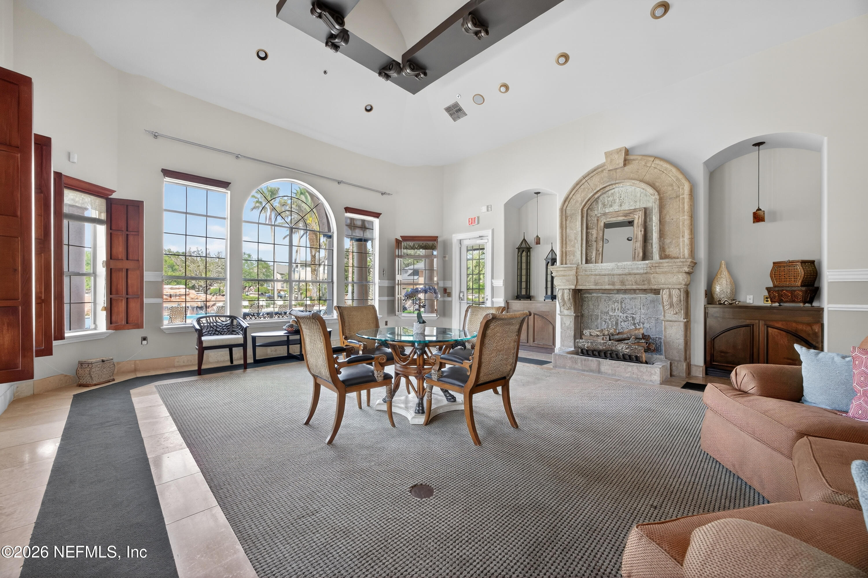10961 Burnt Mill Road, Unit 1524 Jacksonville, FL 32256 - Photo 30 of 38 a view of a livingroom with furniture and a large window