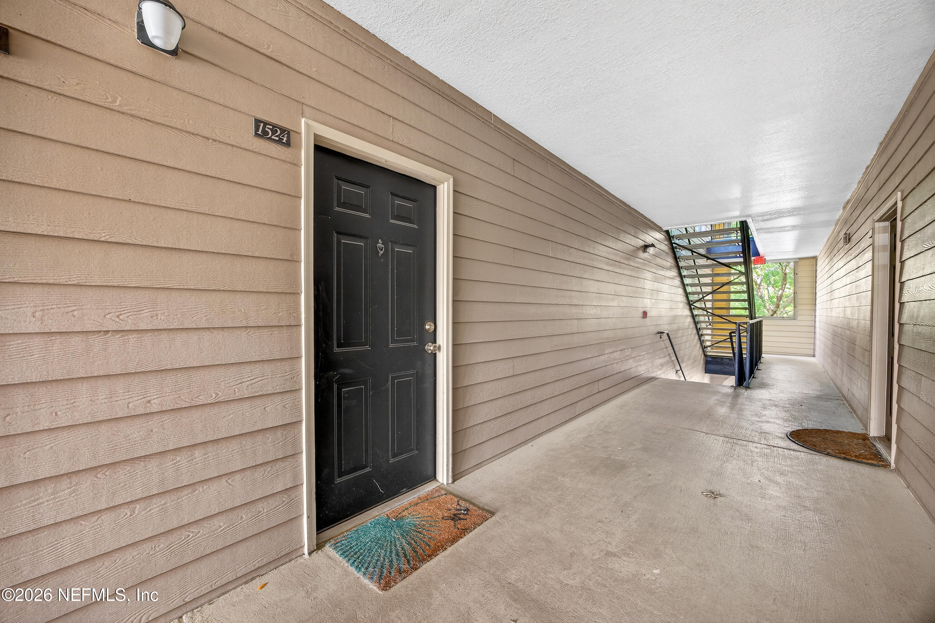 10961 Burnt Mill Road, Unit 1524 Jacksonville, FL 32256 - Photo 4 of 38 a view of entryway door of the house