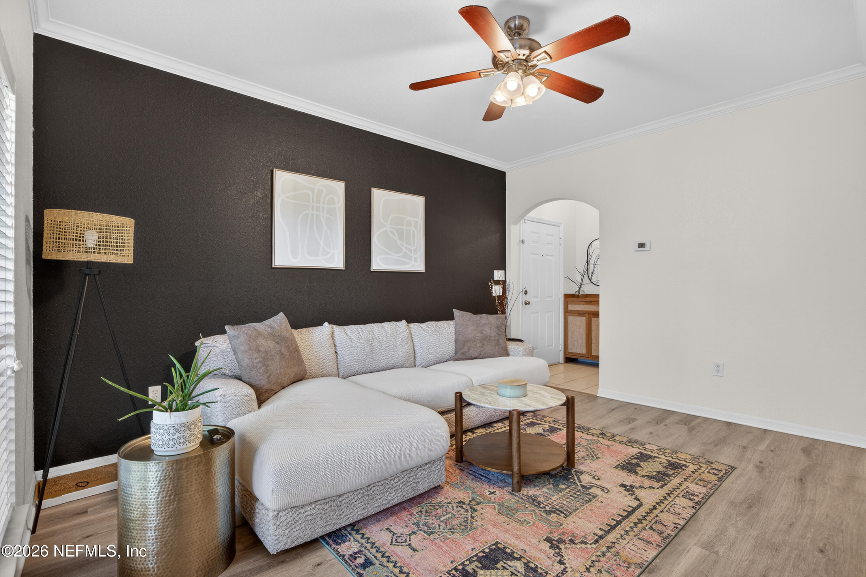 10961 Burnt Mill Road, Unit 1524 Jacksonville, FL 32256 - Photo 6 of 38 a living room with furniture and a rug
