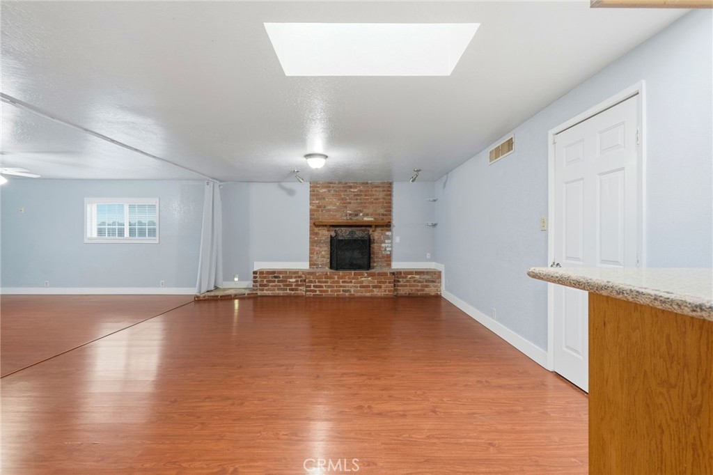 2826 East Hampton Way Fresno, CA 93726 - Photo 7 of 29 a view of a livingroom with a fireplace