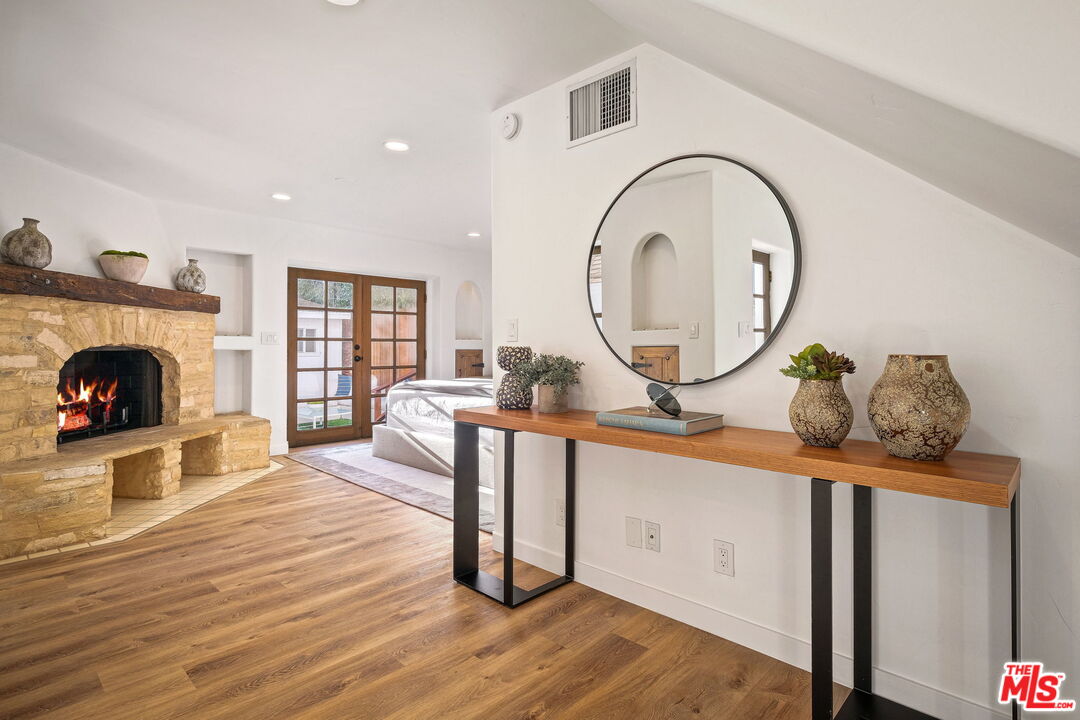 543 Westmount Drive West Hollywood, CA 90048 - Photo 14 of 44 a view of a livingroom with furniture and a fireplace