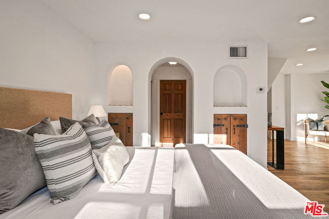 543 Westmount Drive West Hollywood, CA 90048 - Photo 18 of 44 a living room with furniture and a large window