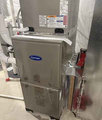 a view of storage and utility room with washer and dryer