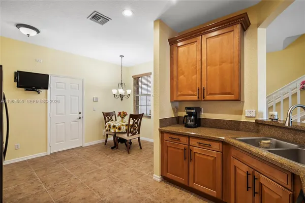 a bedroom with a bed and a cabinets