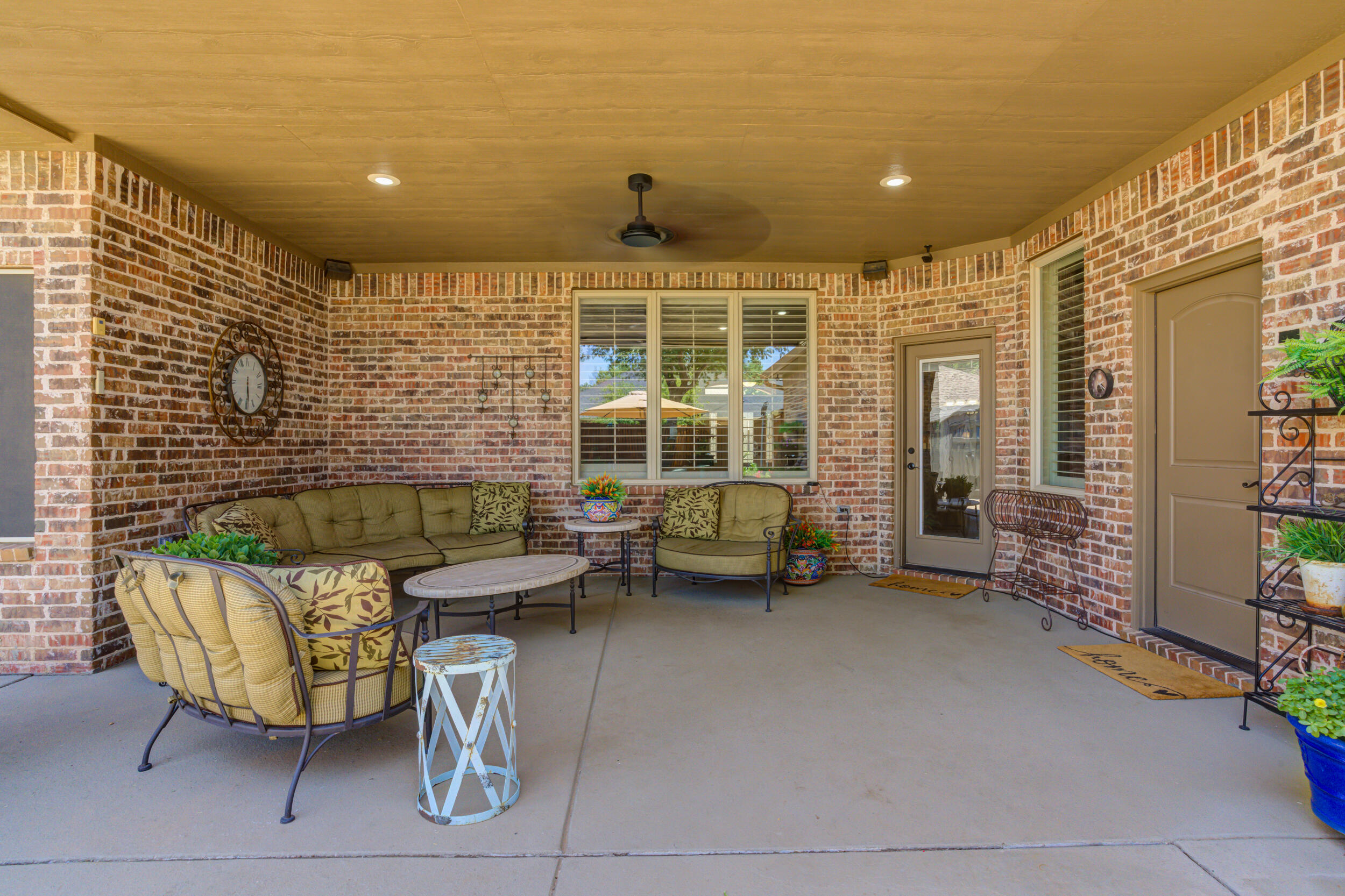 6008 89th Street Lubbock, TX 79424 - Photo 52 of 61 a balcony with furniture and a potted plant