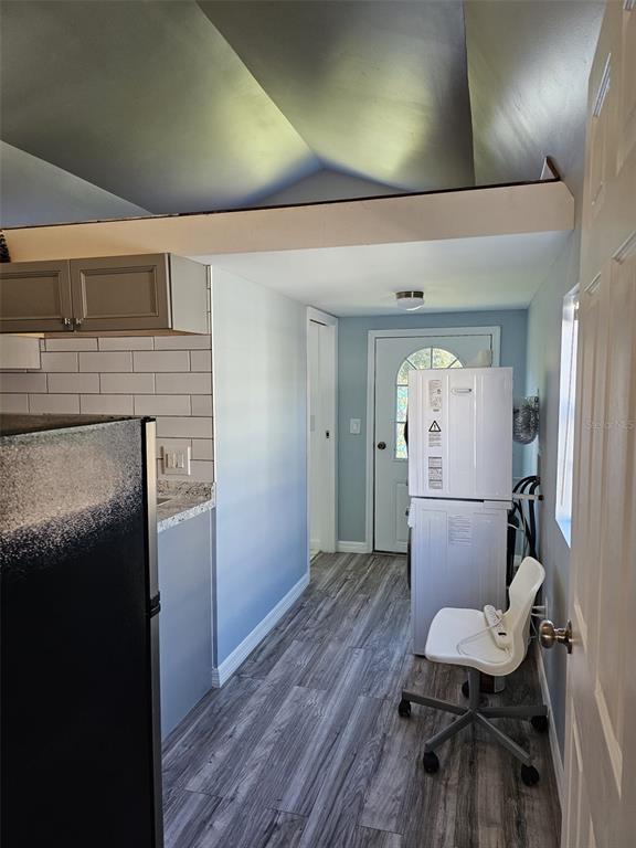 20805 Sheldon Street Orlando, FL 32833 - Photo 13 of 18 a view of a hallway with furniture and wooden floor