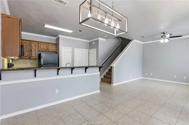 a view of a living room and entry way