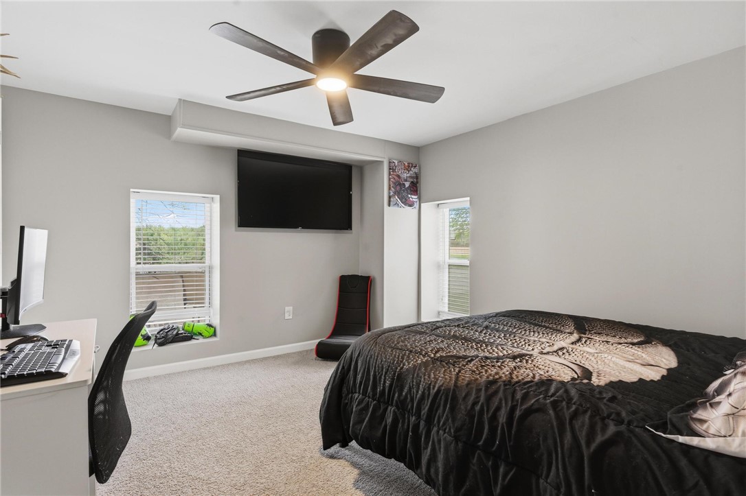 2950 Fairfield Pike Springfield, OH 45502 - Photo 22 of 48 This inviting bedroom features ample natural light and a comforting atmosphere for rest and rejuvenation.