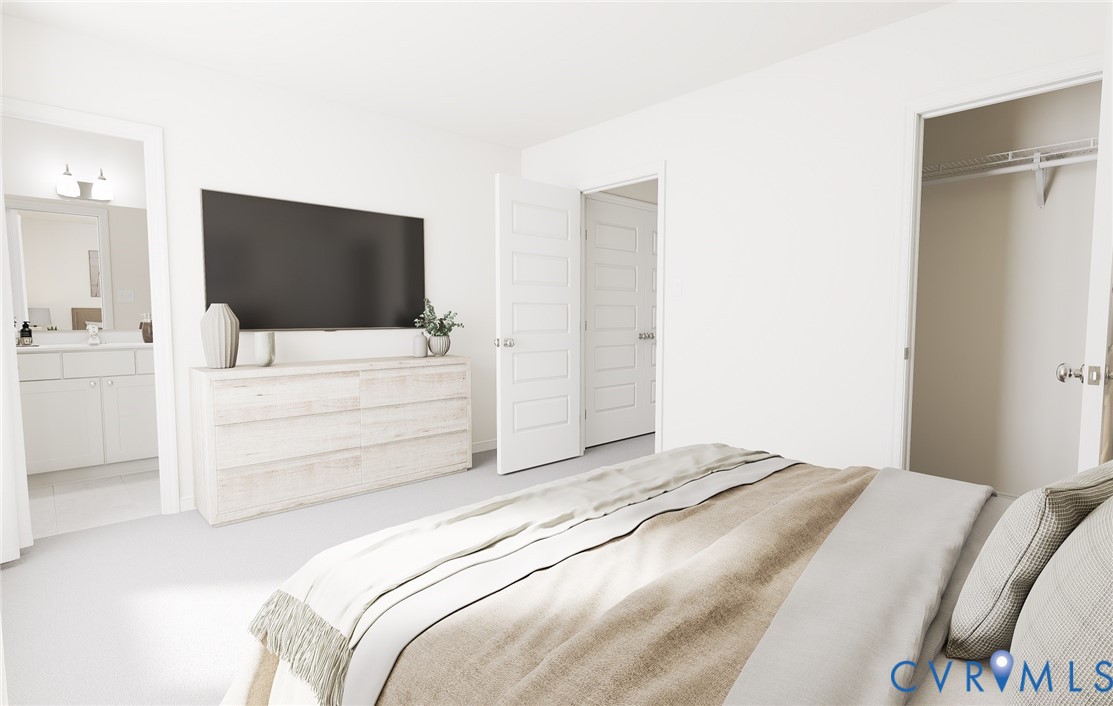 286 Greenpark Road Sandston, VA 23150 - Photo 14 of 26 a bedroom with a bed and a flat screen tv