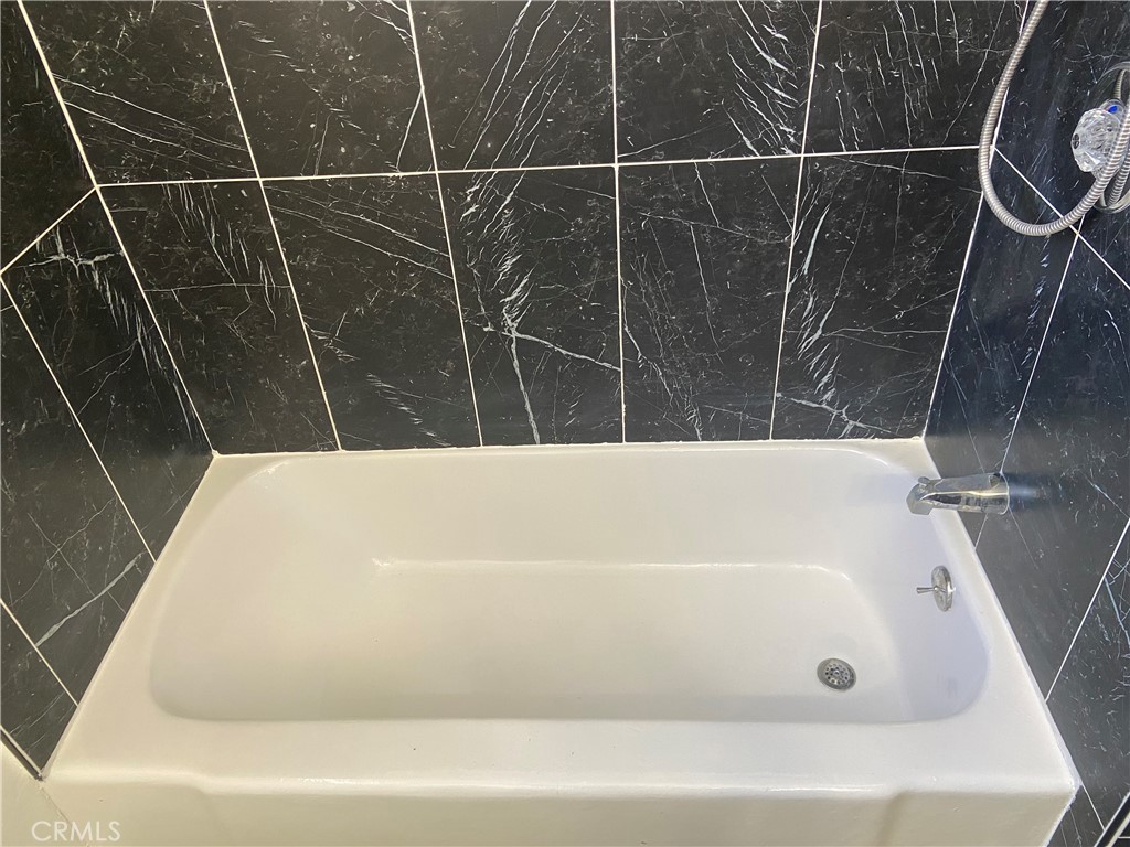 856 Altura Way Upland, CA 91786 - Photo 28 of 33 a bathroom with a bathtub