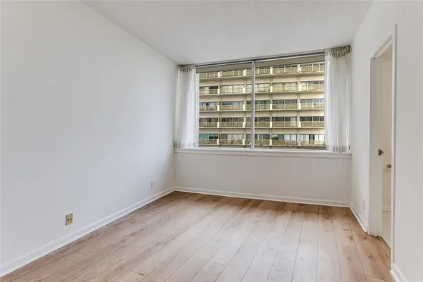 wooden floor and windows in a room