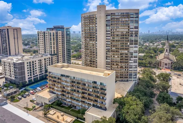 a view of a city with tall buildings