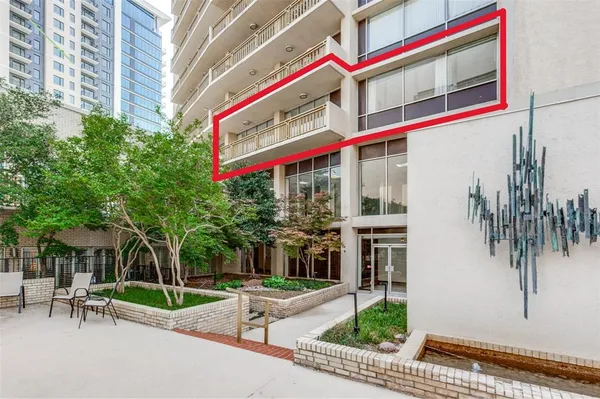 a view of a building with a patio