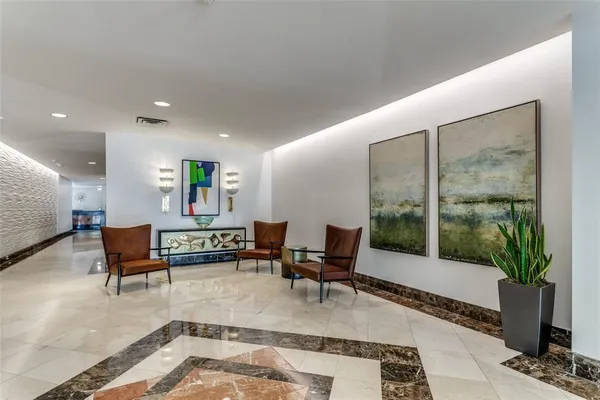 a view of backyard with swimming pool and outdoor seating