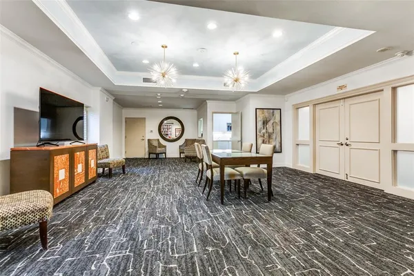 a living room with lots of books