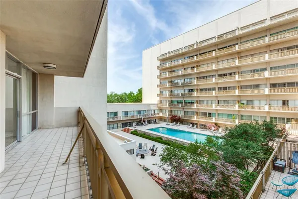 a view of balcony with patio