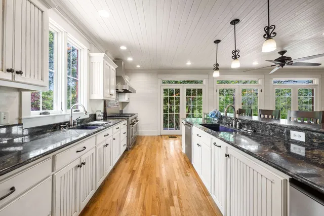 a view of a park with large trees