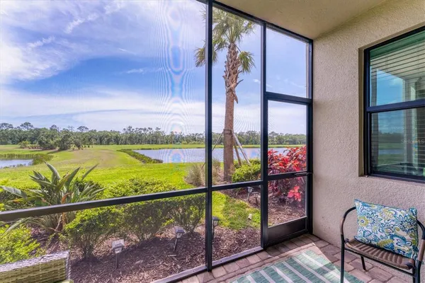 a view of a city with lawn chairs