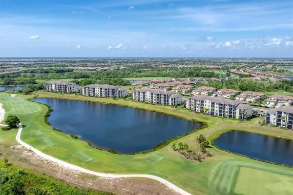 a view of a house with swimming pool