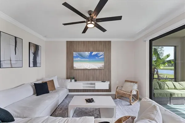 a living room with furniture and a rug