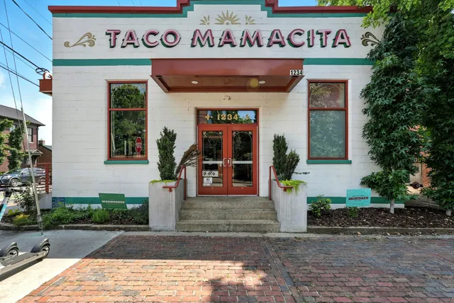 a front view of a house with a porch
