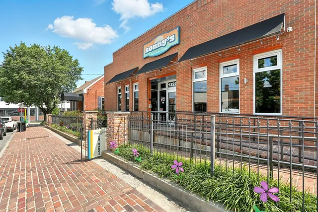 a view of a chair and table in the patio
