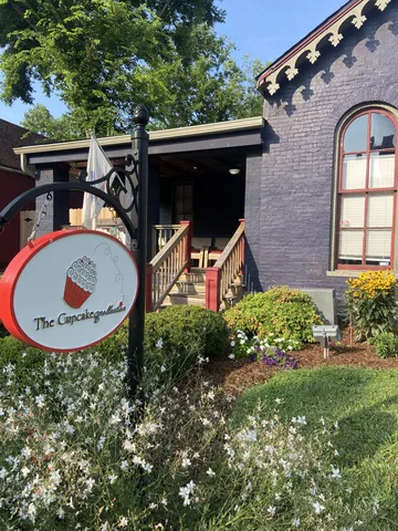 a view of a house with a street