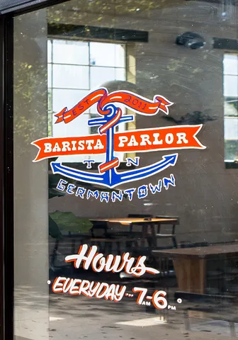 a front view of a building with street