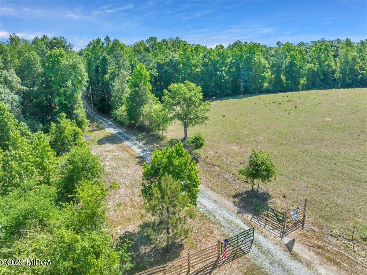 439 Pioneer Road Macon, GA 31217 - Photo 4 of 24 a view of a lake with a yard