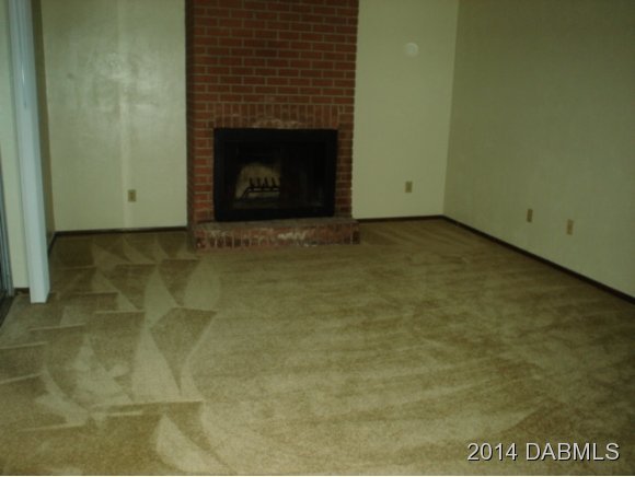 75 Springwood Square Port Orange, FL 32129 - Photo 3 of 6 a view of an empty room