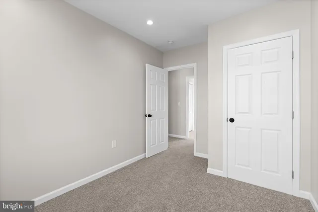 a view of hallway with closet