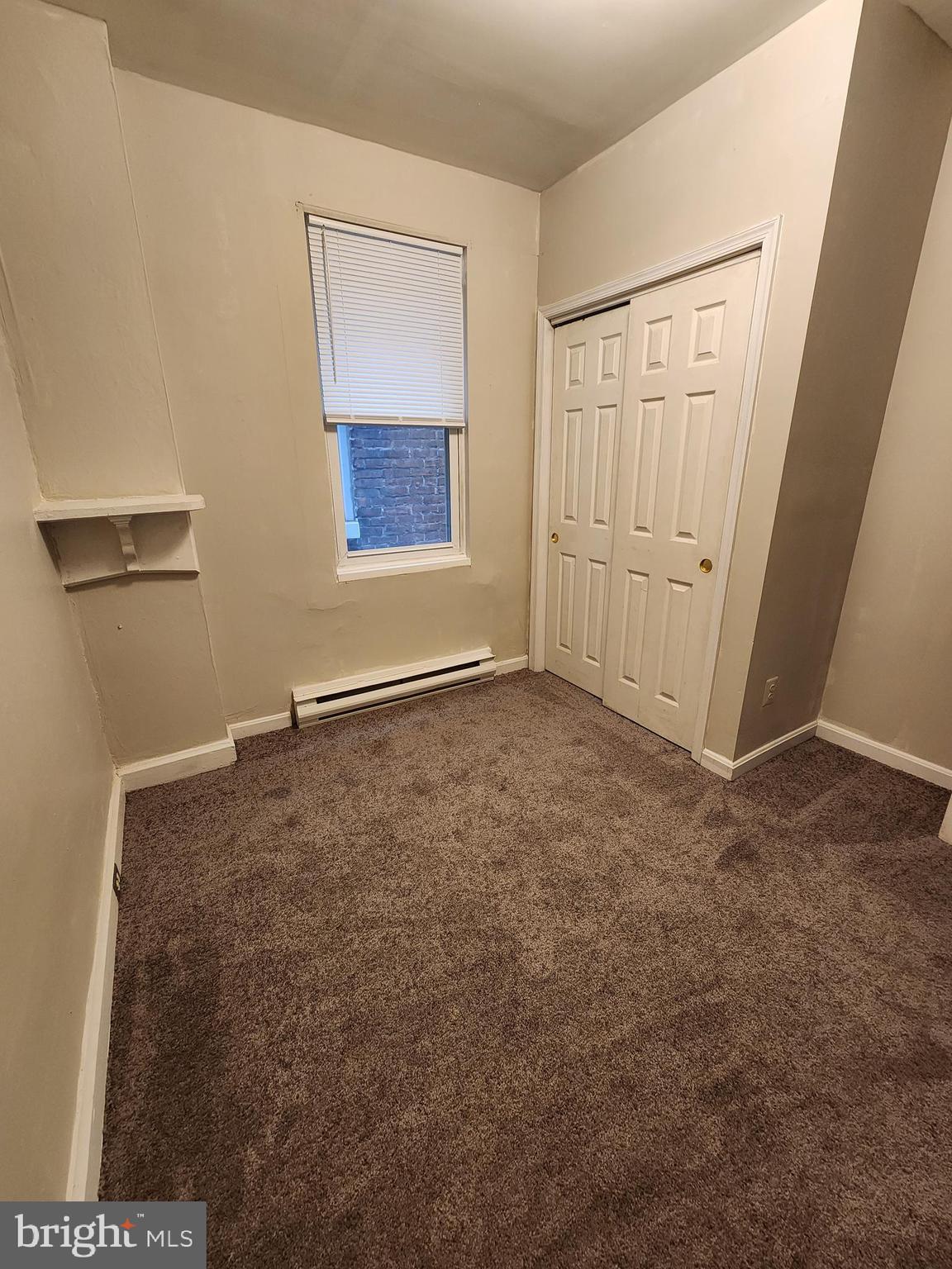 10 North Main Street, Unit 4 Union Bridge, MD 21791 - Photo 3 of 9 an empty room with windows