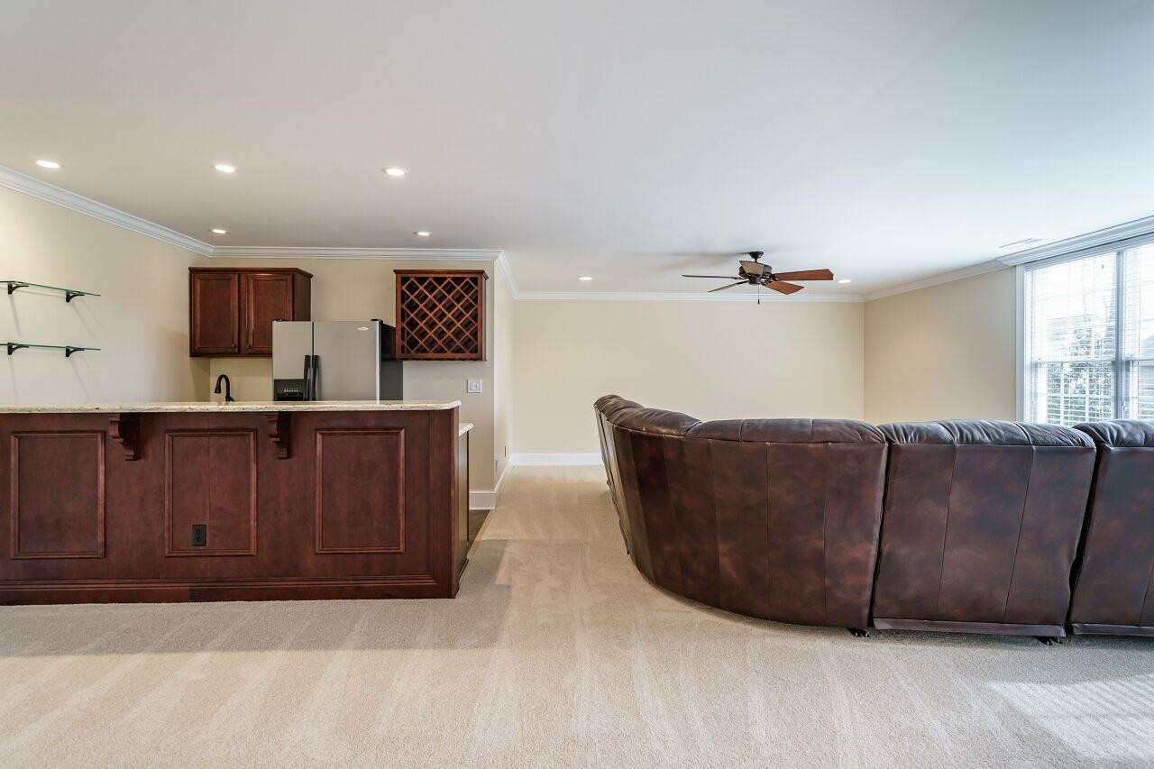 5327 Landguard Drive Raleigh, NC 27613 - Photo 40 of 45 Wet bar area and another section of the open basement perfect for a sectional and movie night! Basement
