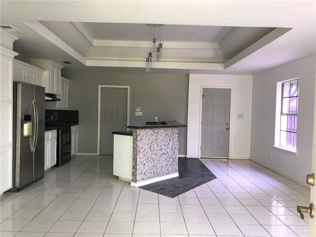 a view of kitchen with windows