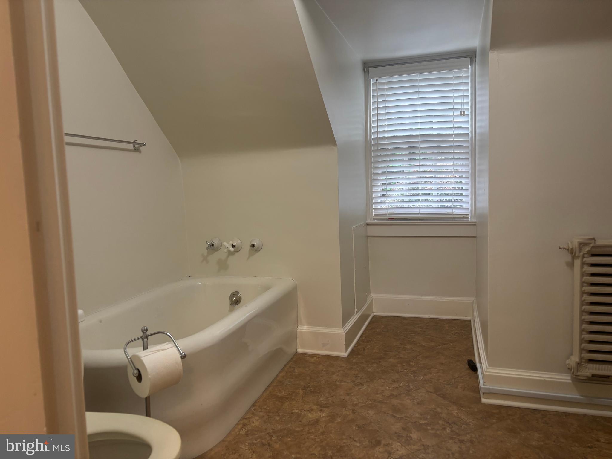 1121 Spring Grove Avenue Lancaster, PA 17603 - Photo 18 of 25 a bathroom with a tub and shower