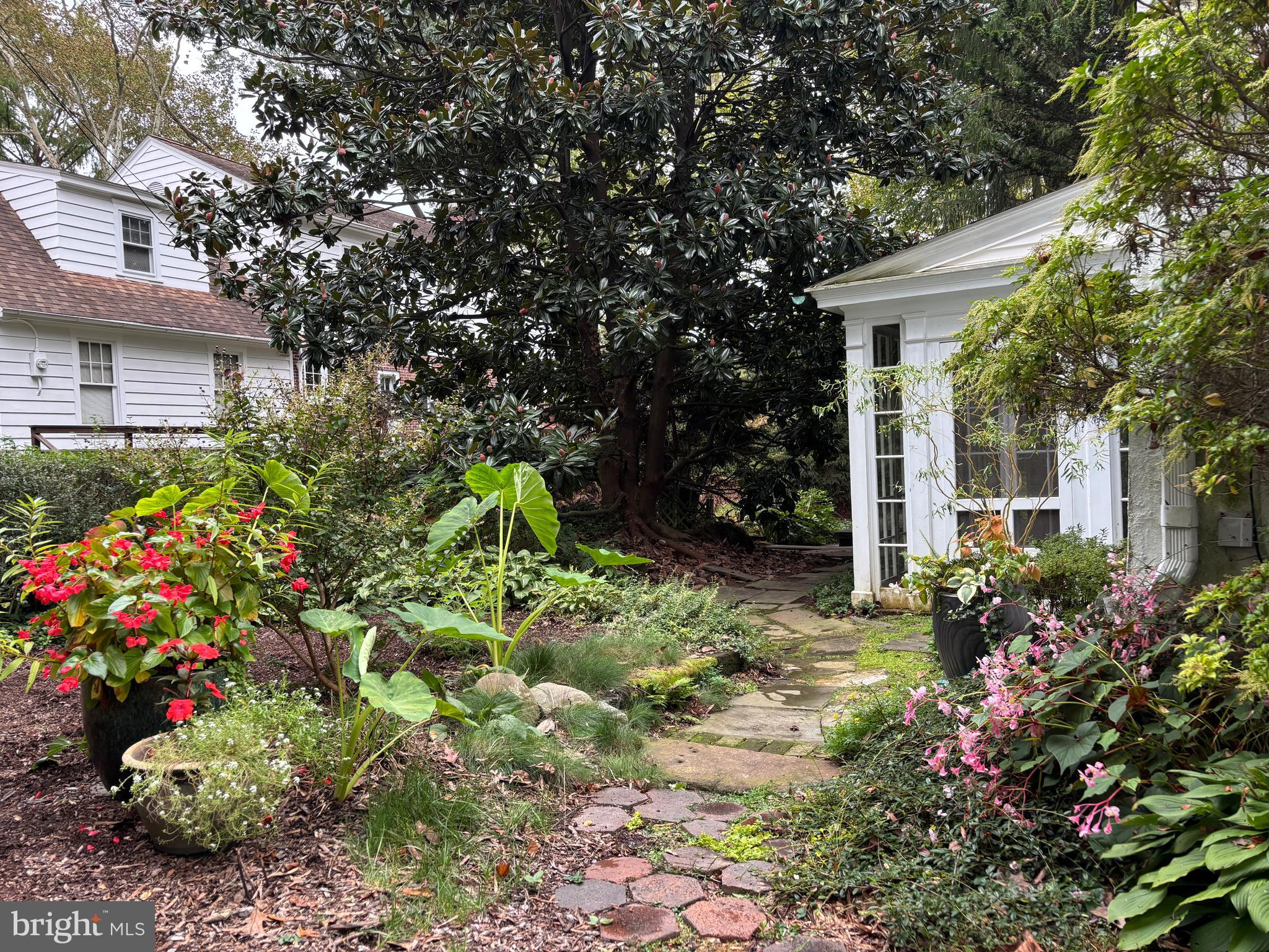 1121 Spring Grove Avenue Lancaster, PA 17603 - Photo 23 of 25 a view of a house with a flower garden