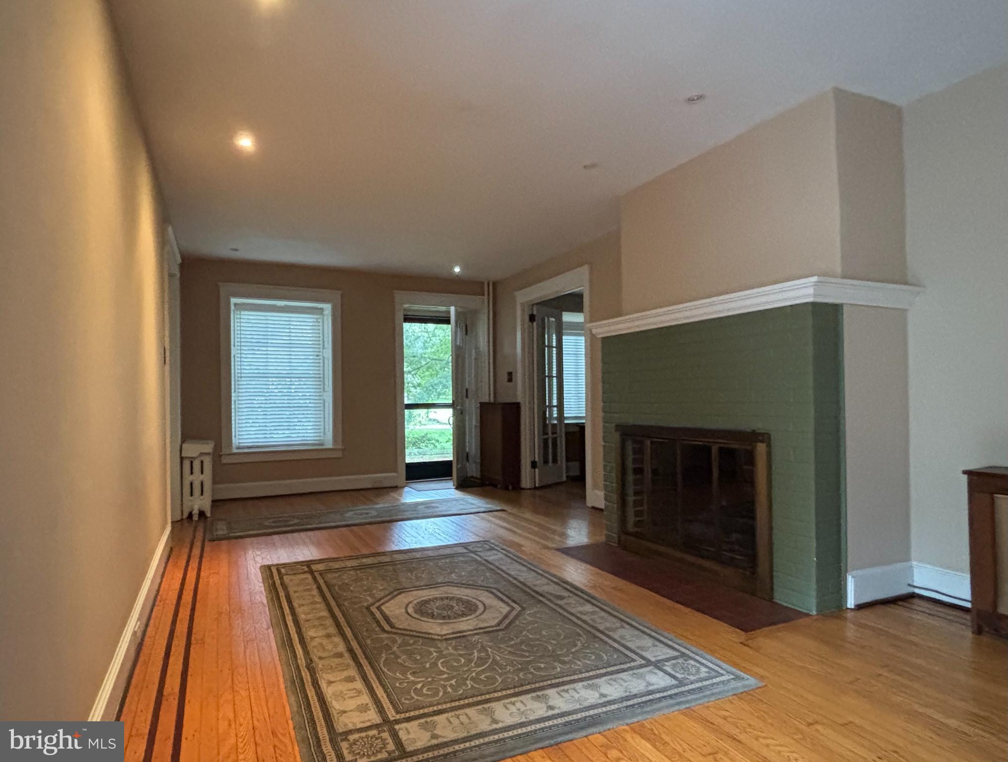 1121 Spring Grove Avenue Lancaster, PA 17603 - Photo 6 of 25 a living room with a fireplace