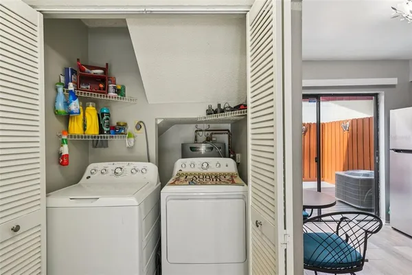 a utility room with dryer and washer