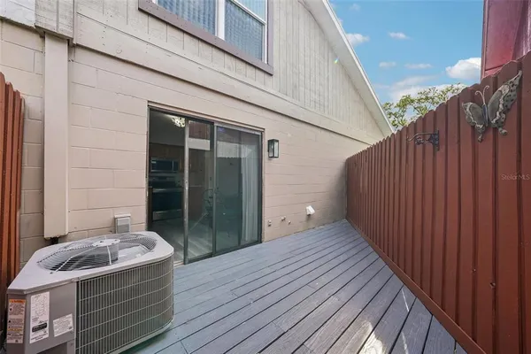 a house view with a wooden fencing