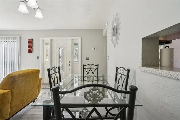 a view of a dining room with furniture