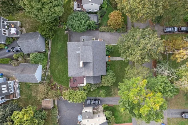 a spacious bathroom with a granite countertop sink a mirror and a