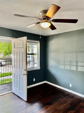 a view of a room with shelf on the wall