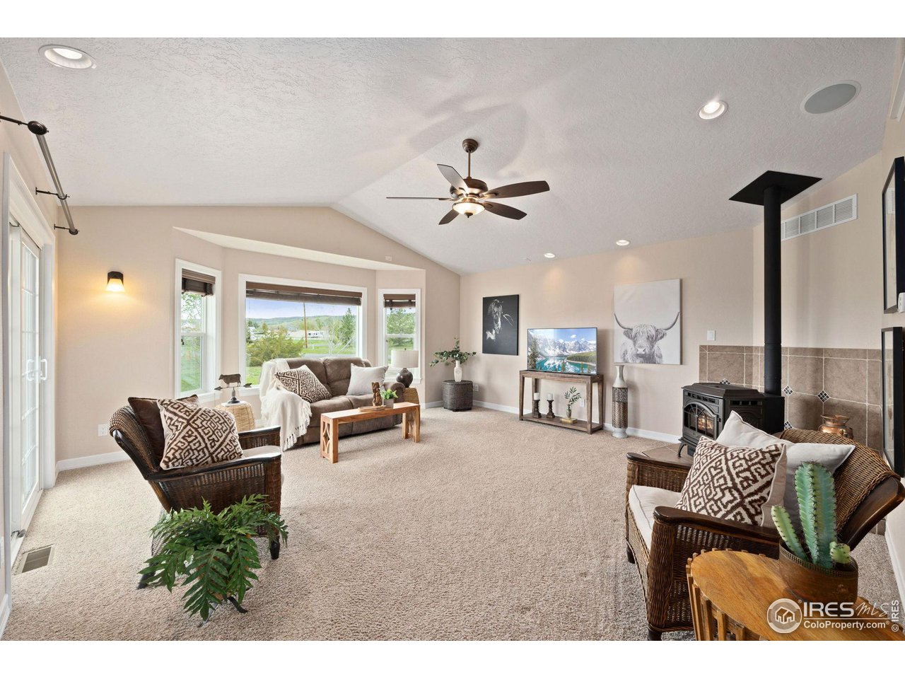 5100 Glen Drive Berthoud, CO 80513 - Photo 15 of 40 a living room with furniture and a large window