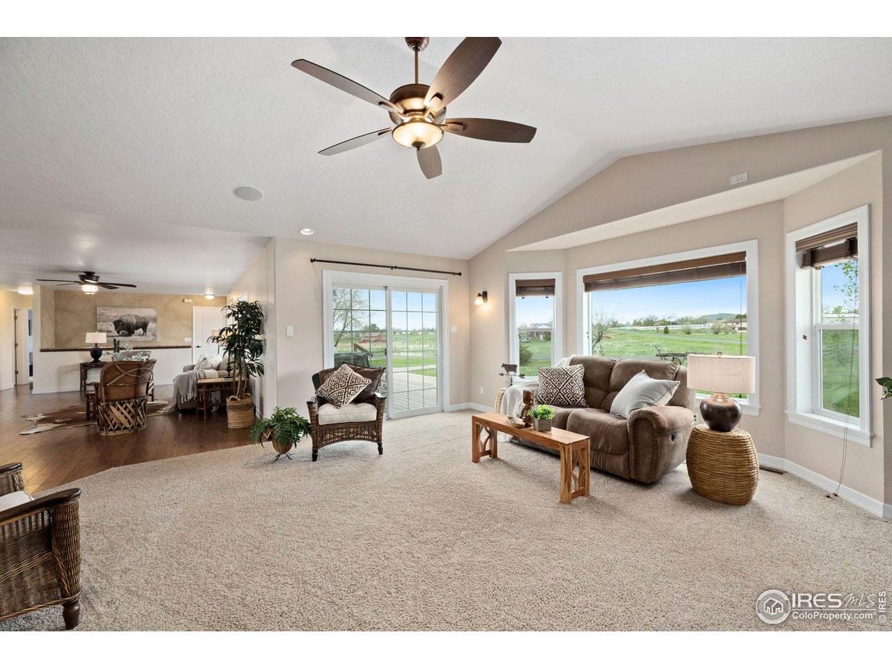 5100 Glen Drive Berthoud, CO 80513 - Photo 17 of 40 a living room with furniture and a large window